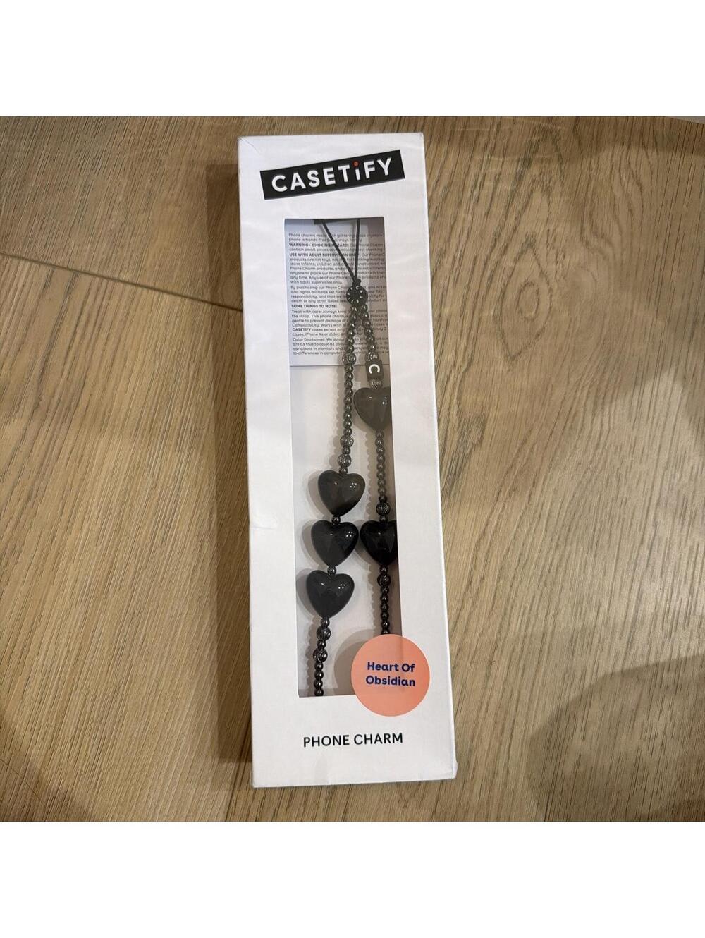 Caestify heart of obsidian phone charm NWT in Box !